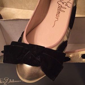 Gold and black womens flat